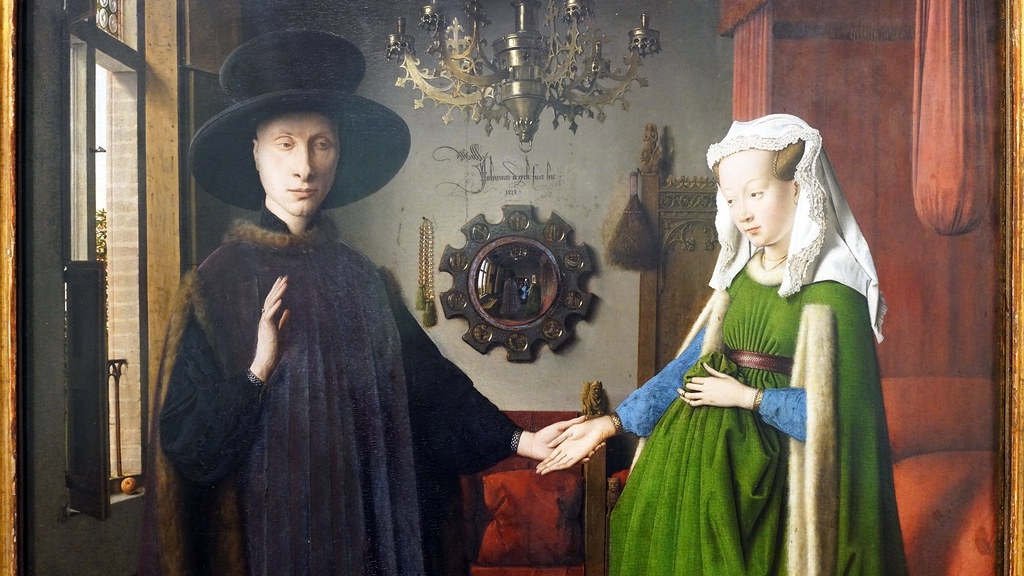 Jan van Eyck's 'Arnolfini Portrait,' an exquisite 15th-century oil painting capturing Giovanni Arnolfini and his wife in their home, filled with symbolic elements and remarkable attention to detail, reflective of the Northern Renaissance's artistic mastery.