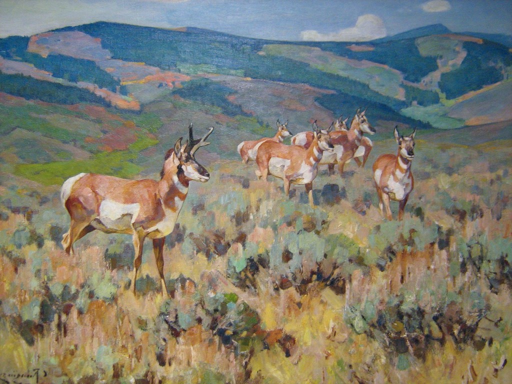 Oil painting by Carl Rungius of three Big Horn Sheep on a mountainous terrain with snow-capped peaks in the background. Great wildlife art