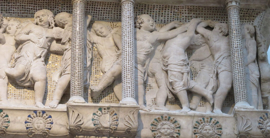The detail of the Cantoria frieze by Donatello reflects the joy and energy of music and dance in religious devotion.