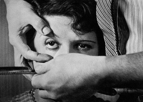 Un Chien Andalou (1928) film still reflects the surrealist film’s shocking and dreamlike imagery
