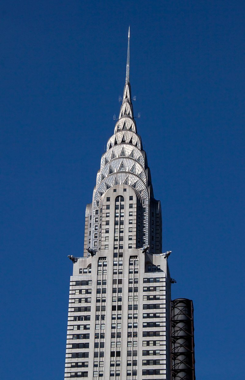The Chrysler Building (1930), captured in May 2009, reflects the pinnacle of Art Deco design, embodying the era's love for geometric precision, luxury, and modernity