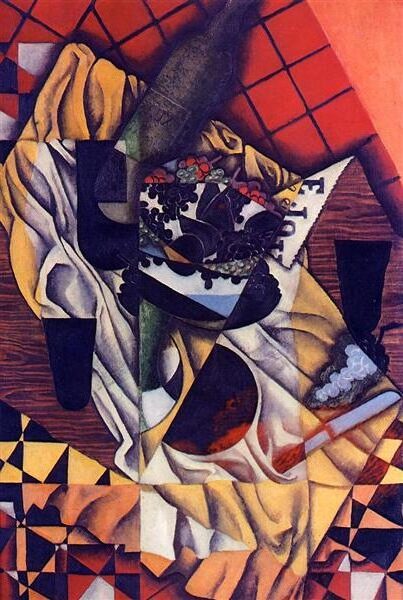 Grapes (1913) by Juan Gris reflects a Cubist still life featuring a bunch of grapes, fragmented and reassembled into geometric forms
